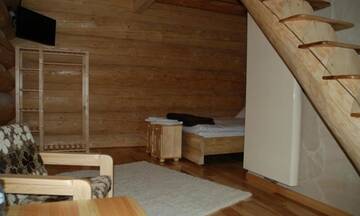 Фото номера Четырехместный номер с мезонином Мини-отель Pod Koziorożcami г. Trzebiechów 35